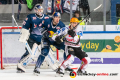 Daniel Fiessinger (Torwart, EHC Red Bull Muenchen) und Keith Aulie (EHC Red Bull Muenchen) verteidigen gegen Justin Feser (Fischtown Pinguins Bremerhaven) in der Hauptrundenbegegnung der Deutschen Eishockey Liga zwischen dem EHC Red Bull München und den Fischtown Pinguins Bremerhaven am 16.02.2020.