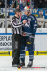 Linesman Andreas Hofer erklärt Keith Aulie (EHC Red Bull Muenchen) die Lage in der Hauptrundenbegegnung der Deutschen Eishockey Liga zwischen dem EHC Red Bull München und dem ERC Ingolstadt am 26.12.2019.