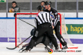 Linesman Andreas Hofer und Linesman Marius Woelzmueller versuchen Andrew Bodnarchuk (EHC Red Bull Muenchen) unter Kontrolle zu bringen in der Hauptrundenbegegnung der Deutschen Eishockey Liga zwischen dem EHC Red Bull München und den Straubing Tigers am 06.03.2020.