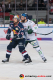 John Mitchell (EHC Red Bull Muenchen) vor Arvids Rekis (Augsburger Panther) in der 1. Halbfinalbegegnung in den Playoffs der Deutschen Eishockey Liga zwischen dem EHC Red Bull München und den Augsburger Panthern am 03.04.2019.