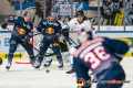 Philip Gogulla (EHC Red Bull Muenchen), Yasin Ehliz (EHC Red Bull Muenchen) und Antoine Laganiere (Straubing Tigers) erwarten einen Schuss von Yannic Seidenberg (EHC Red Bull Muenchen) in der Hauptrundenbegegnung der Deutschen Eishockey Liga zwischen dem EHC Red Bull München und den Straubing Tigers am 29.11.2019.