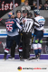 Die Schiedsrichter versuchen die Unstimmigkeiten zwischen Ryan Button (EHC Red Bull Muenchen) und Marcel Noebels (Eisbaeren Berlin) zu schlichten in der 3. Viertelfinalbegegnung in den Playoffs der Deutschen Eishockey Liga zwischen dem EHC Red Bull München und den Eisbären Berlin am 17.03.2019.